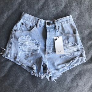 High waisted, ripped shorts